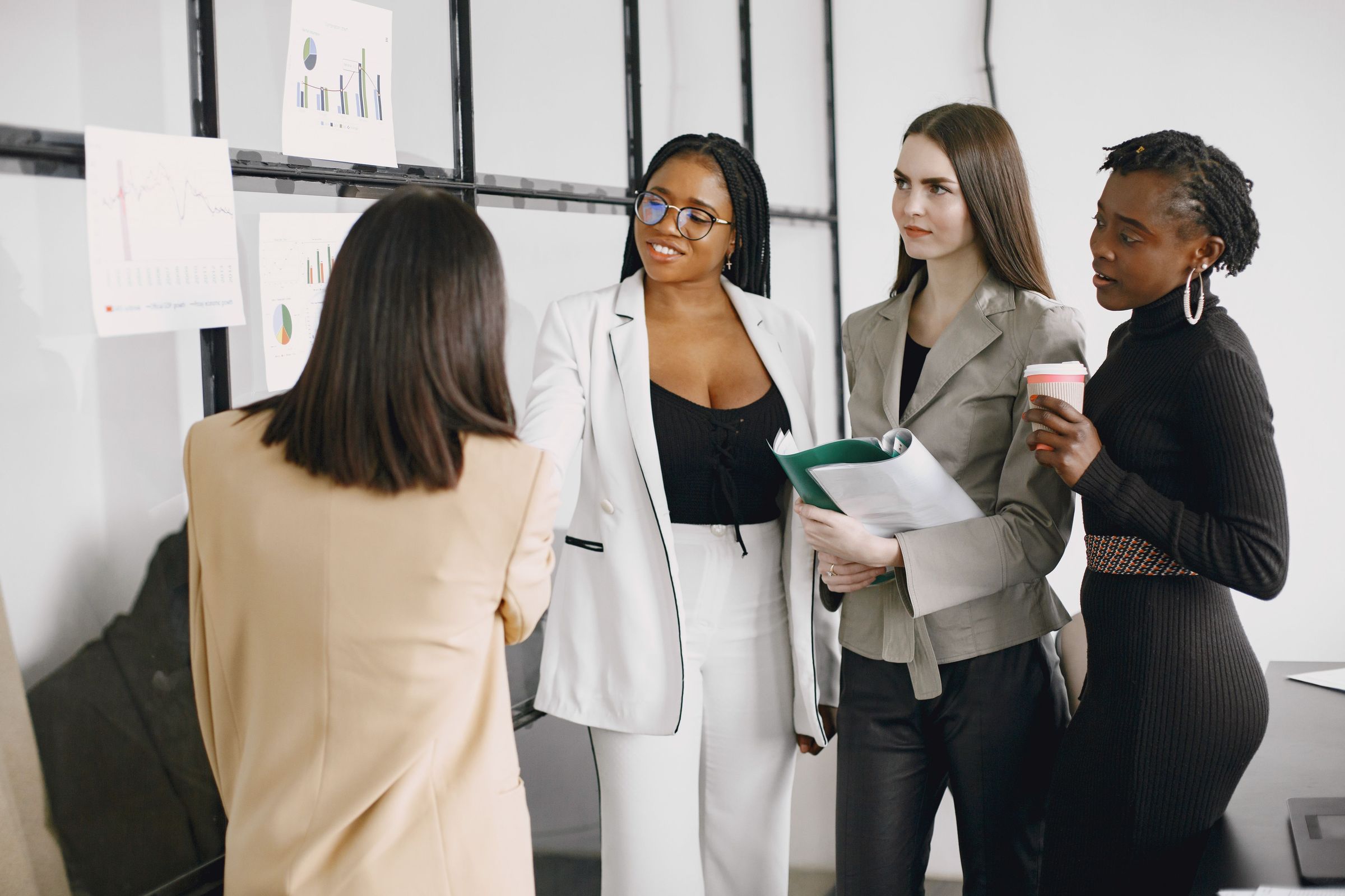 Women talking together in an office