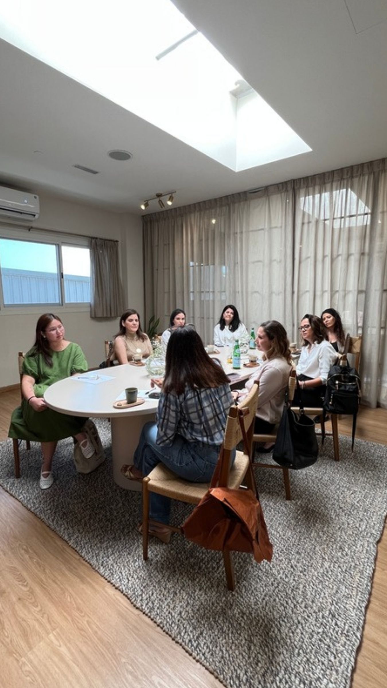 Women around a table at a RETURNready session
